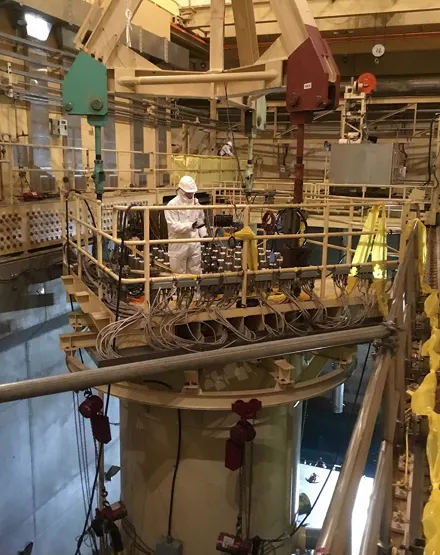 FIGURE 1. Heavy lift rig attached to reactor head in preparation for removal.