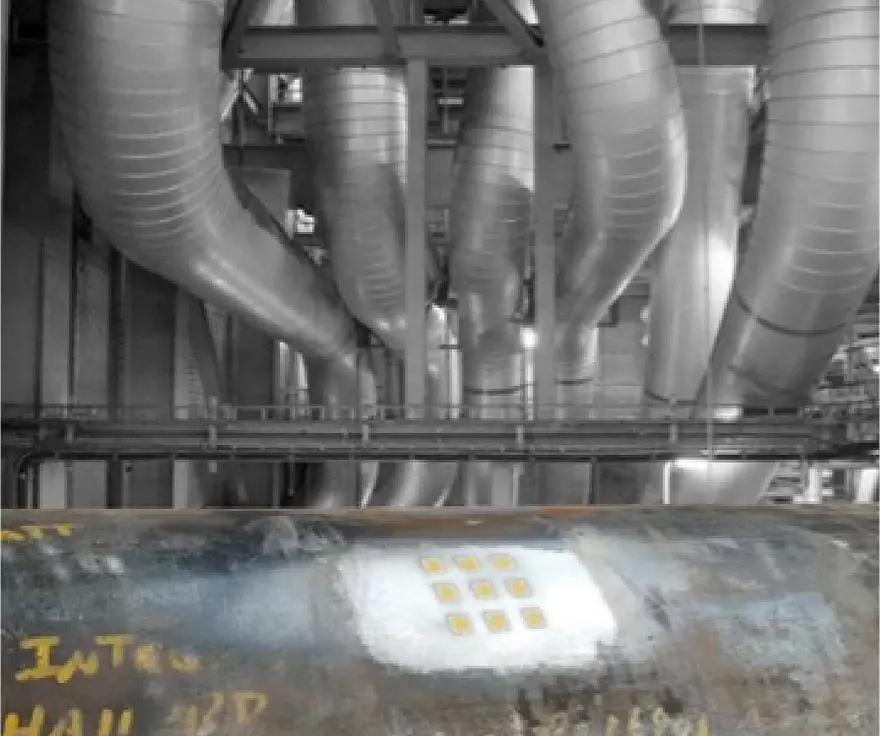 FIGURE 1. Photograph of an ultrasonic thick-film array for monitoring wall-thickness over a critical area of a component.